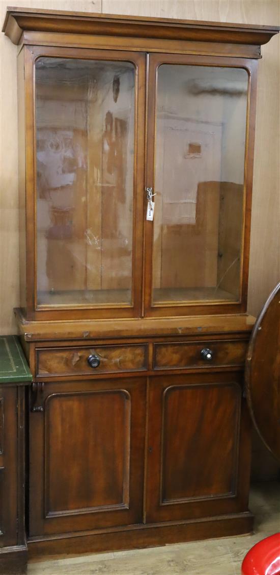 A Victorian mahogany bookcase cupboard W.96cm